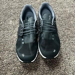 Men’s On shoes. Like new but something stuck on side from store. See photo